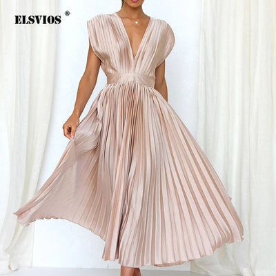 Hedwig | New women's dress with pleats, zip and sleeveless design